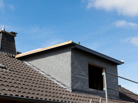 New dormer and scaffolding structure at the construction site